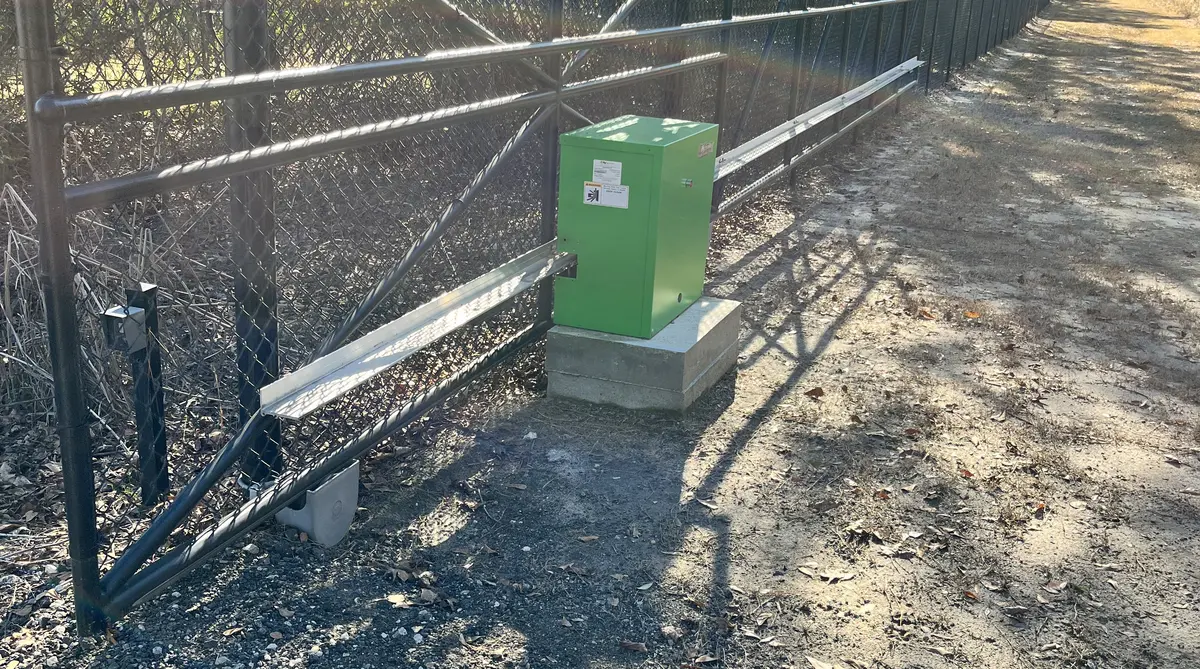 Dubya Fence crew installing commercial gate in South Carolina