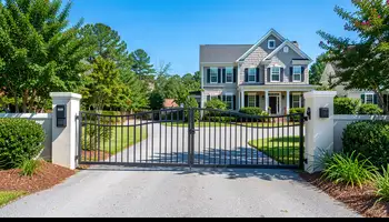 Electric gate repair technician working on gate operator in Branchville SC