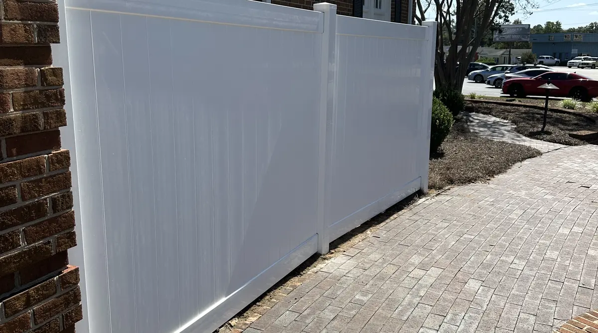 Vinyl fence installation in Orangeburg SC by Dubya LLC - white privacy fence